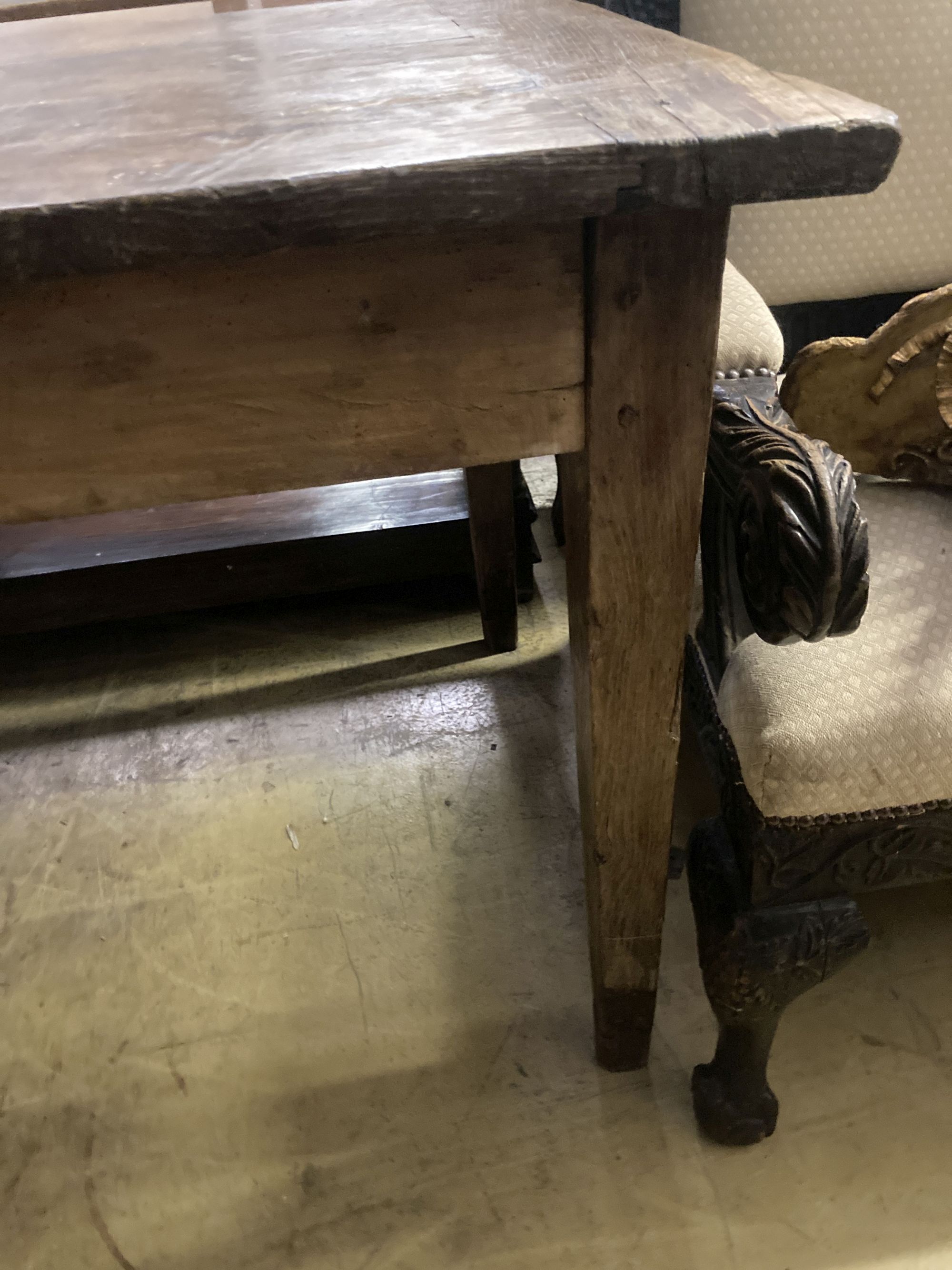 An early 19th century French oak rectangular kitchen table, length 218cm, depth 79cm, height 77cm